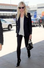 KIRSTEN DUNST Arrives at Los Angeles International Airport