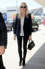 KIRSTEN DUNST Arrives at Los Angeles International Airport