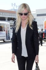 KIRSTEN DUNST Arrives at Los Angeles International Airport