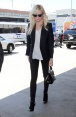 KIRSTEN DUNST Arrives at Los Angeles International Airport