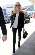 KIRSTEN DUNST Arrives at Los Angeles International Airport