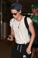 KRISTEN STEWART Arrives at Airport in Tokyo 2709