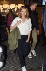 KYLIE MINOGUE at hHeathrow Airport in London 0209