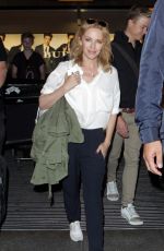 KYLIE MINOGUE at hHeathrow Airport in London 0209