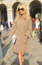 LAURA WHITMORE Arrives at Somerset House for London Fashion Week
