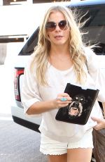 LEANN RIMES in Shorts Arrives at LAX Airport