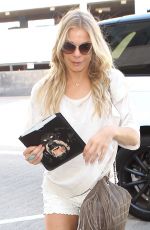 LEANN RIMES in Shorts Arrives at LAX Airport
