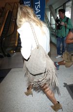 LEANN RIMES in Shorts Arrives at LAX Airport