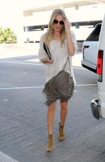 LEANN RIMES in Shorts Arrives at LAX Airport