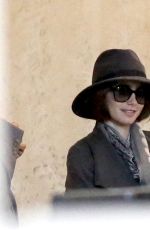 LILY COLLINS ar Los Angeles International Airport 2309