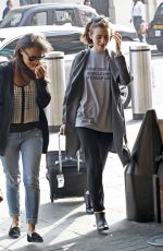 LILY COLLINS at A Railway Station in London