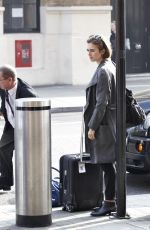 LILY COLLINS at A Railway Station in London
