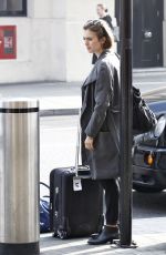 LILY COLLINS at A Railway Station in London
