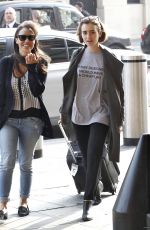 LILY COLLINS at A Railway Station in London