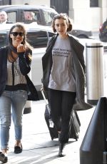 LILY COLLINS at A Railway Station in London