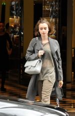LILY COLLINS Out Shopping in Paris