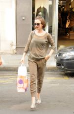 LILY COLLINS Out Shopping in Paris