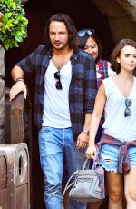 LILY COLLINS with New Boyfriend in Disneyland in Los Angeles