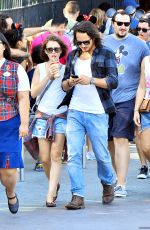 LILY COLLINS with New Boyfriend in Disneyland in Los Angeles