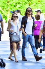 LILY COLLINS with New Boyfriend in Disneyland in Los Angeles