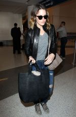 MANDY MOORE Arrives at Los Angeles International Airport