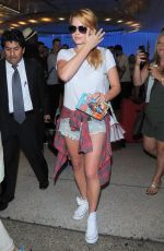 MARGOT ROBBIE in Denim Shorts Arrives at LAX