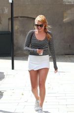 MARGOT ROBBIE in Shorts at a Park in London