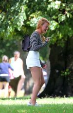MARGOT ROBBIE in Shorts at a Park in London