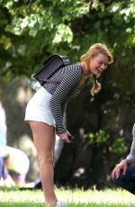 MARGOT ROBBIE in Shorts at a Park in London