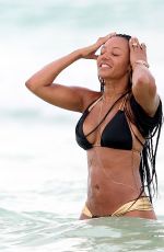 MELANIE BROWN in Bbikini at a Beach in Mexico