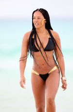 MELANIE BROWN in Bbikini at a Beach in Mexico