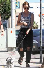 MENA SUVARI Walks Her Dog Out in Los Angeles