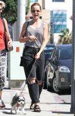 MENA SUVARI Walks Her Dog Out in Los Angeles