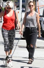 MENA SUVARI Walks Her Dog Out in Los Angeles