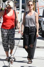 MENA SUVARI Walks Her Dog Out in Los Angeles