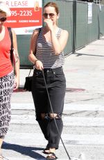 MENA SUVARI Walks Her Dog Out in Los Angeles