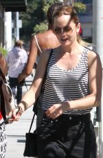 MENA SUVARI Walks Her Dog Out in Los Angeles