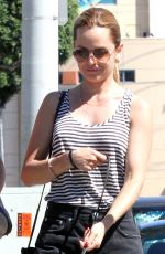 MENA SUVARI Walks Her Dog Out in Los Angeles
