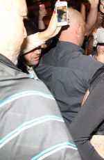 MILEY CYRUS Leaves a Sushi Restaurant in Rio De Janeiro