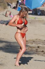 NIKKI LUND in Bikini at a Beach in Malibu