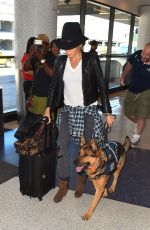 NIKKI REED and Her Dog at LAX Airport
