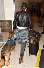 NIKKI REED and Her Dog at LAX Airport