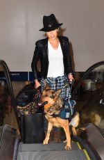 NIKKI REED and Her Dog at LAX Airport