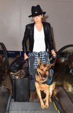 NIKKI REED and Her Dog at LAX Airport