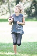 OLIVIA HOLT Plays Football at a Park in Sherman Oaks