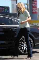 Pregnant ALI LARTER at a Gas Station in Los Angeles