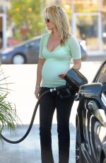 Pregnant ALI LARTER at a Gas Station in Los Angeles