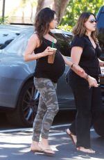 Pregnant MILA KUNIS in Tights Leaves Starbucks in Studio City