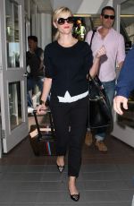 REESE WITHERSPOON Arrives at Los Angeles International Airport 0909
