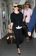 REESE WITHERSPOON Arrives at Los Angeles International Airport 0909